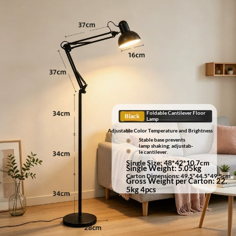 Hand holding the remote control to dim the floor lamp