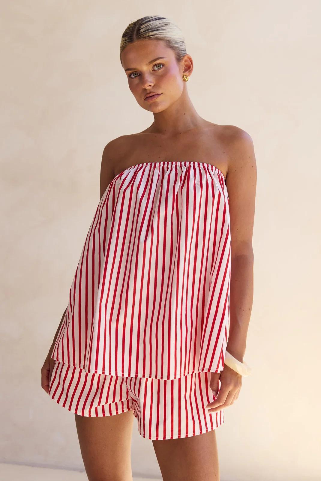 Detail crop of the tube top's straight strapless neckline across the shoulders