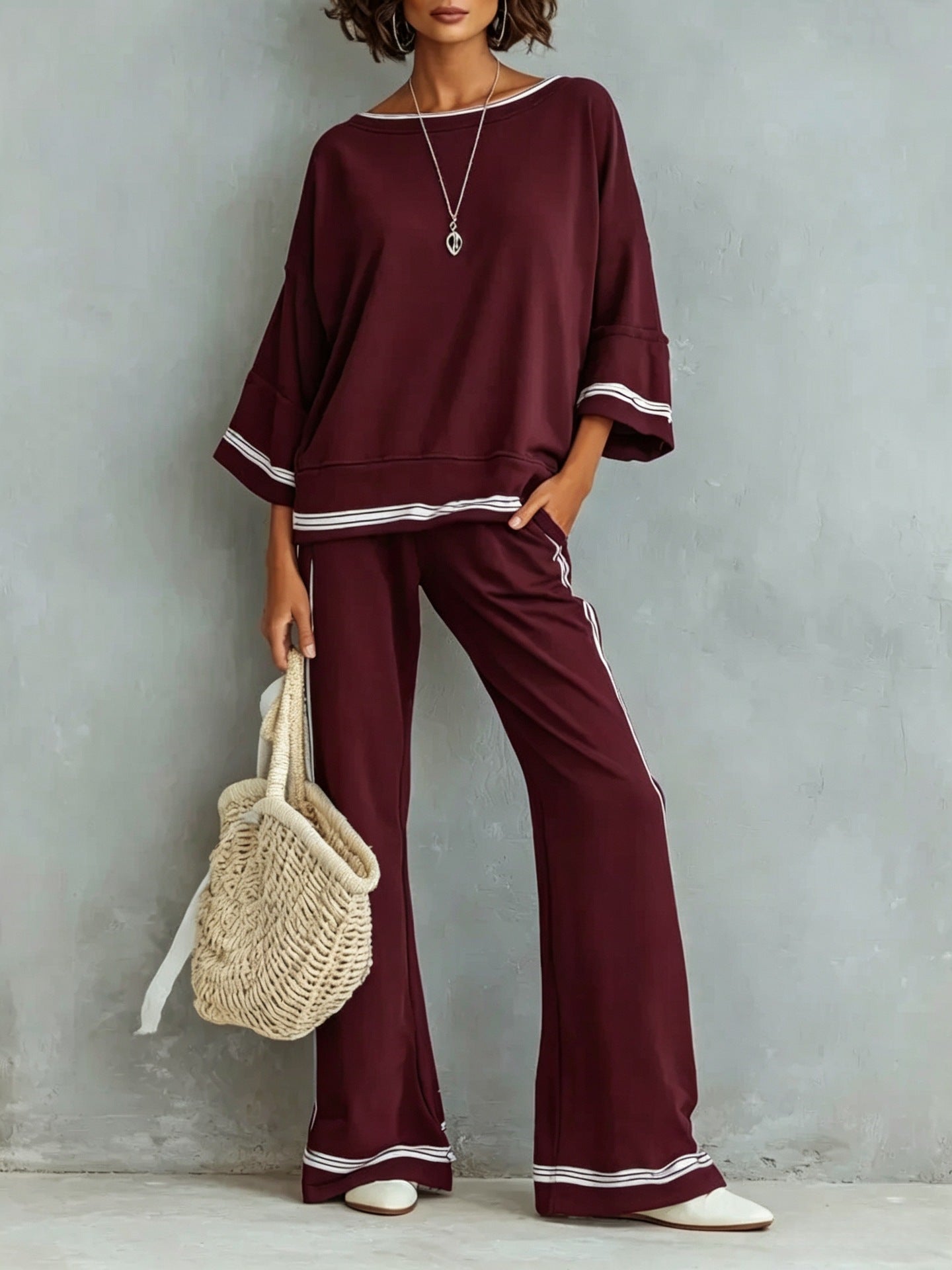Detail of the trouser waistband and front pleat line