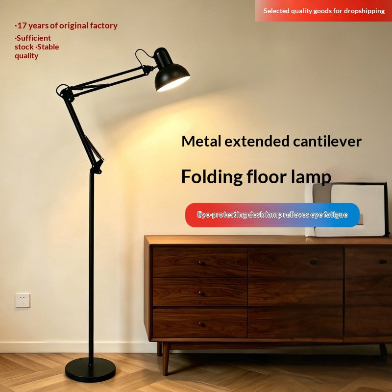 Slim iron LED floor lamp standing in a dim living room at dusk