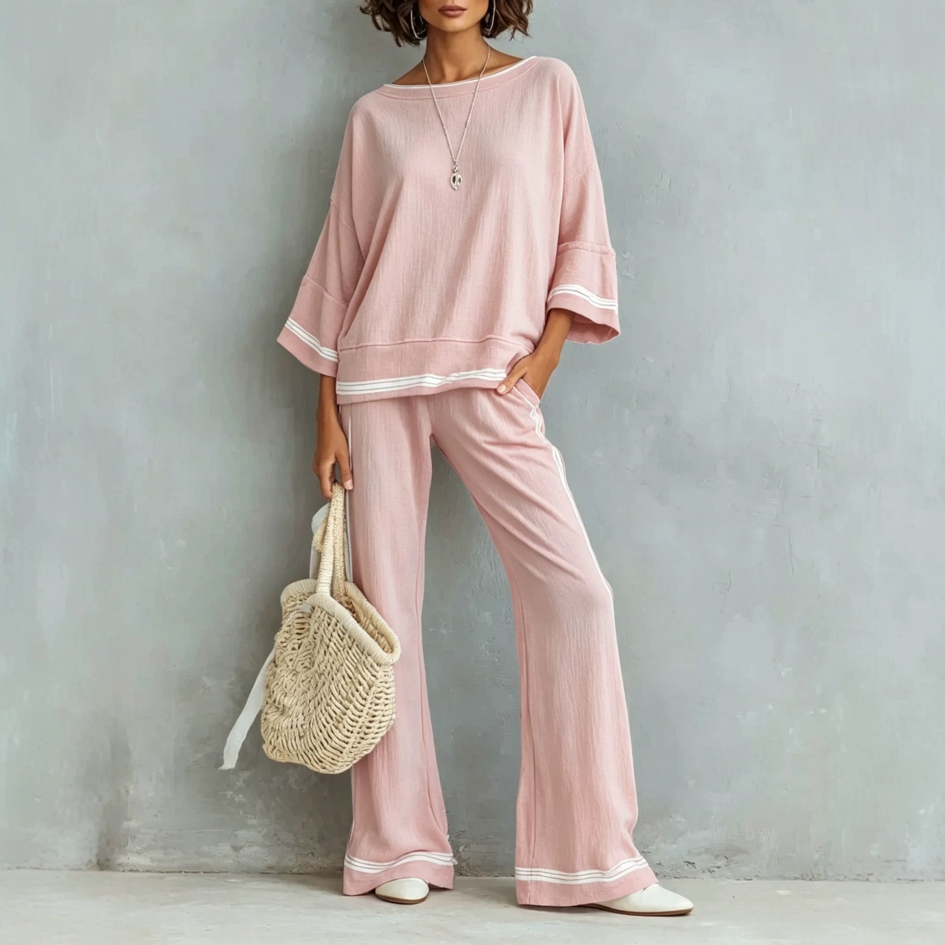 Front view of the matching top and wide-leg trousers styled together