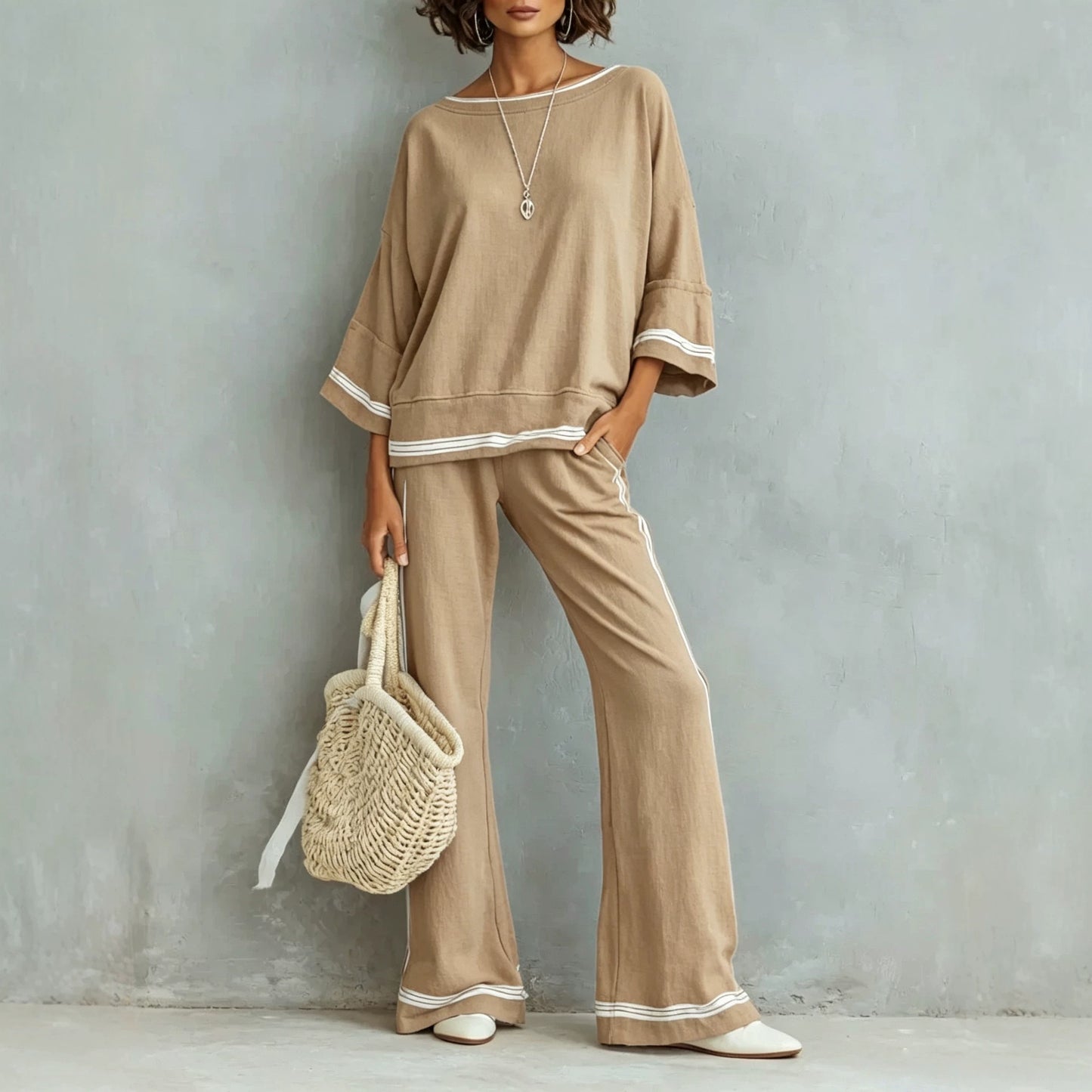 Back view of the two-piece set on warm-grey backdrop