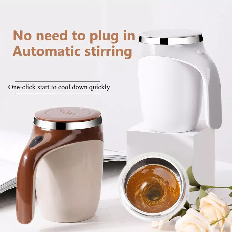 Rechargeable electric stirring coffee cup mixing milk into coffee on a linen tabletop